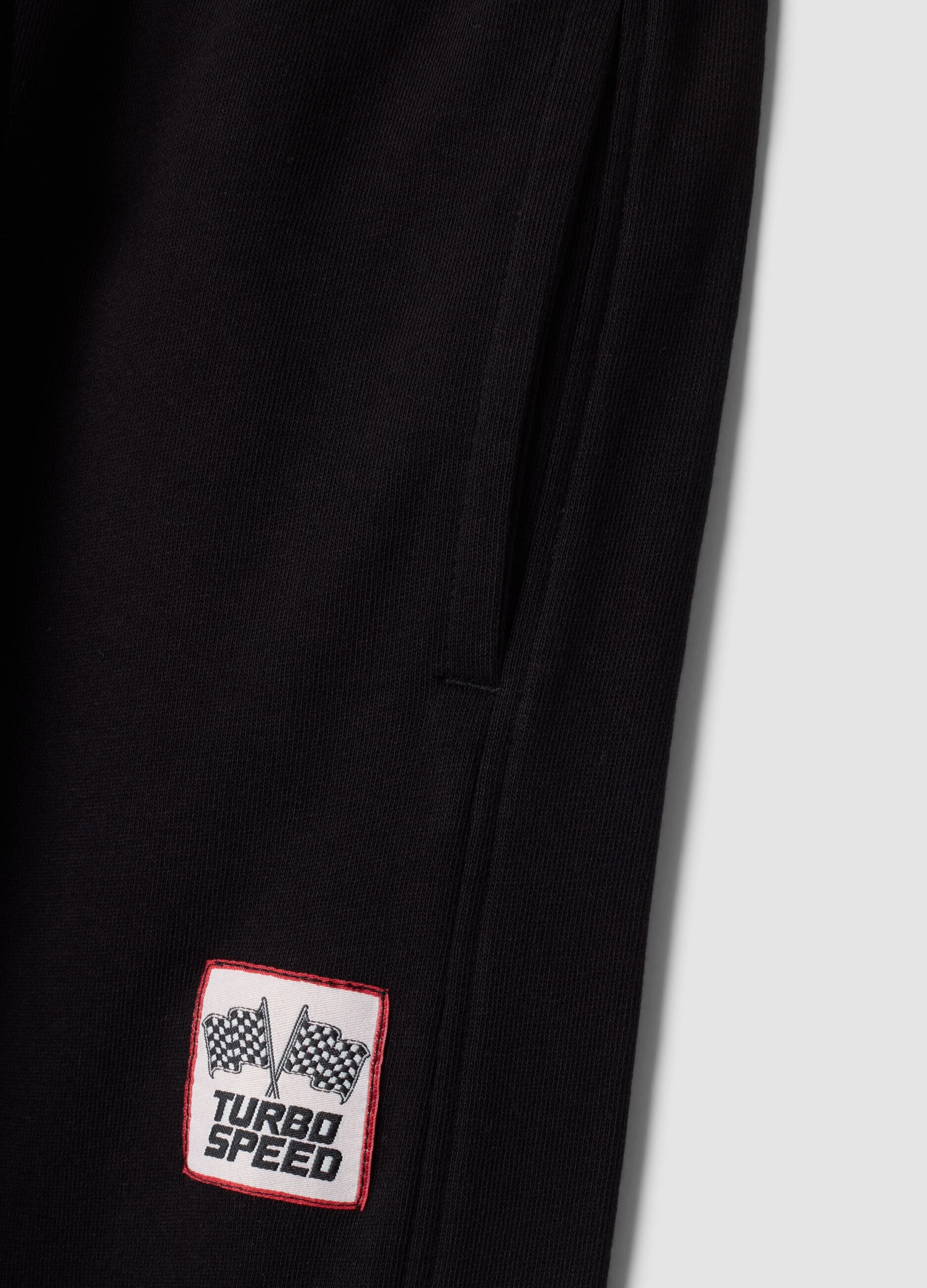 Pantaloni jogger neri in puro cotone con fondo elastico