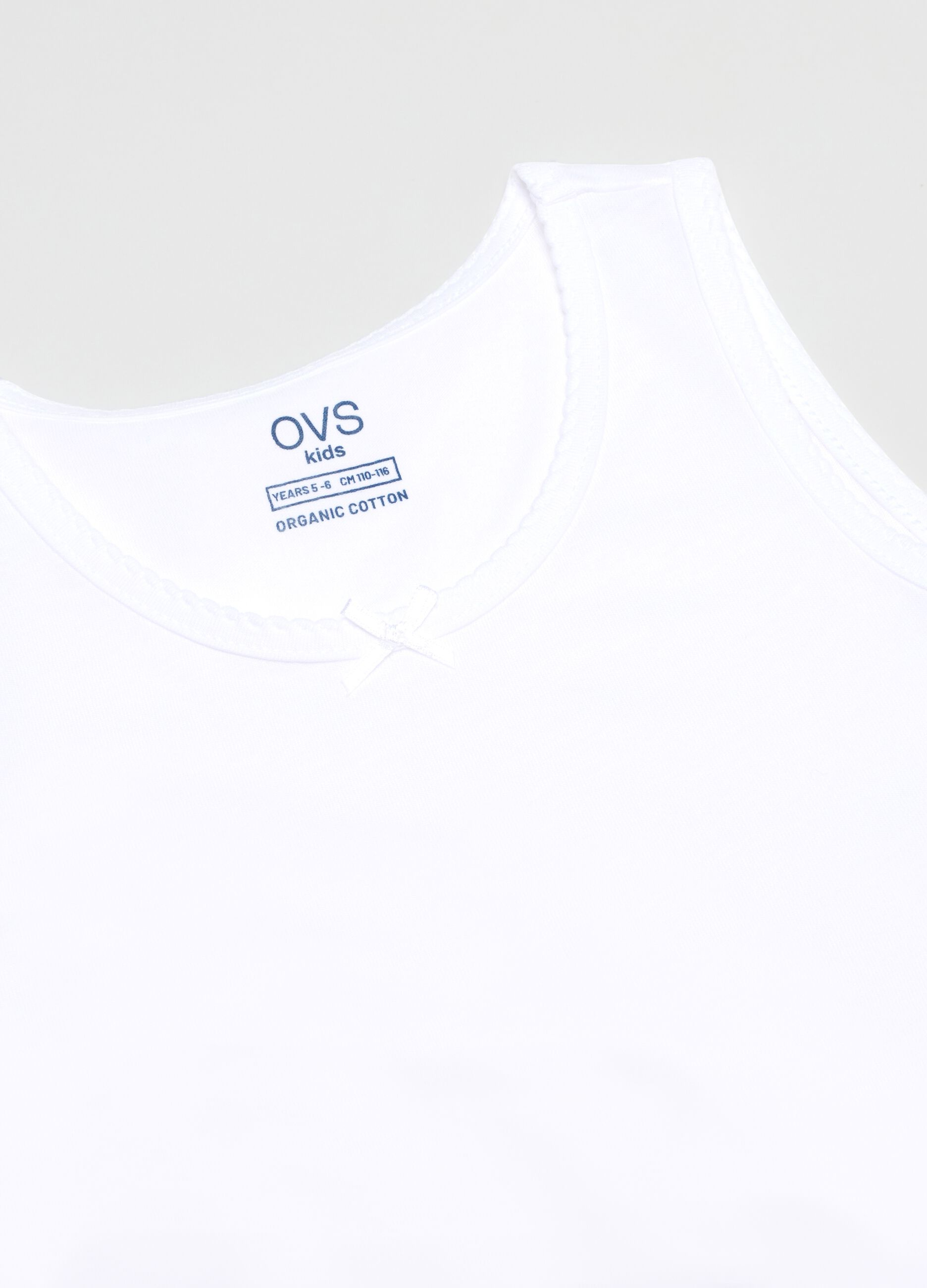 Twin pack of white girls' vests in pure cotton regular fit