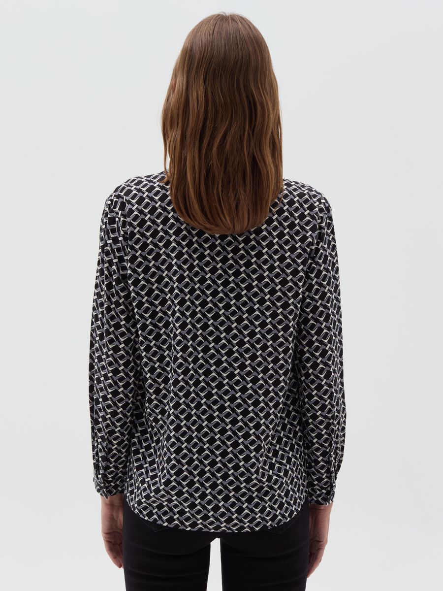 Blusa con scollo a polo maniche lunghe_3
