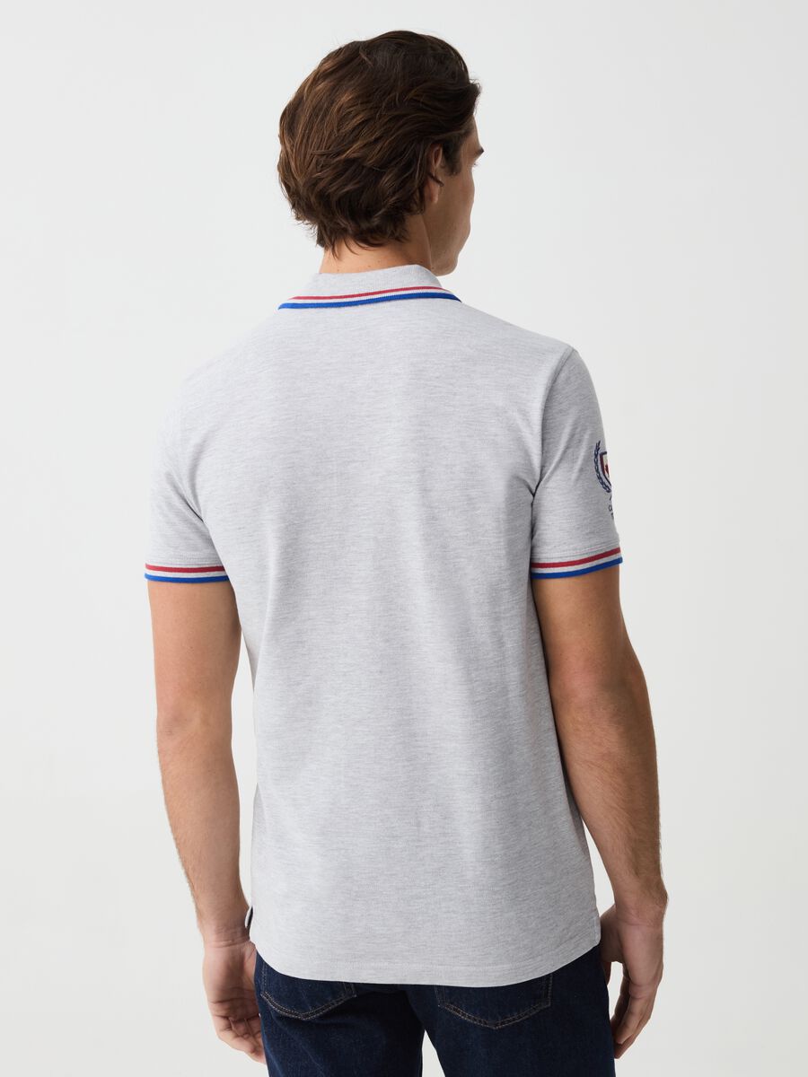 Polo shirt with striped edging patch and logo embroidery_2