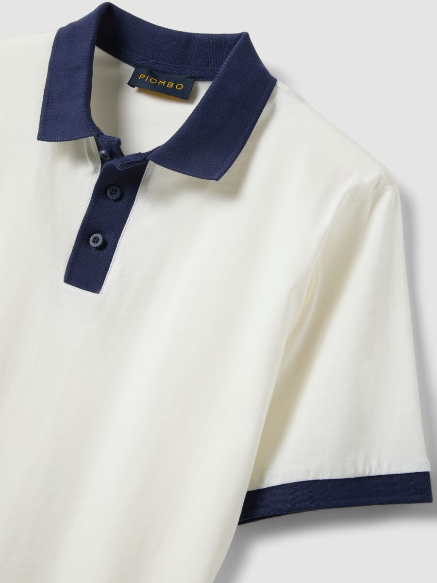 Polo bianca in puro cotone con colletto a contrasto_1