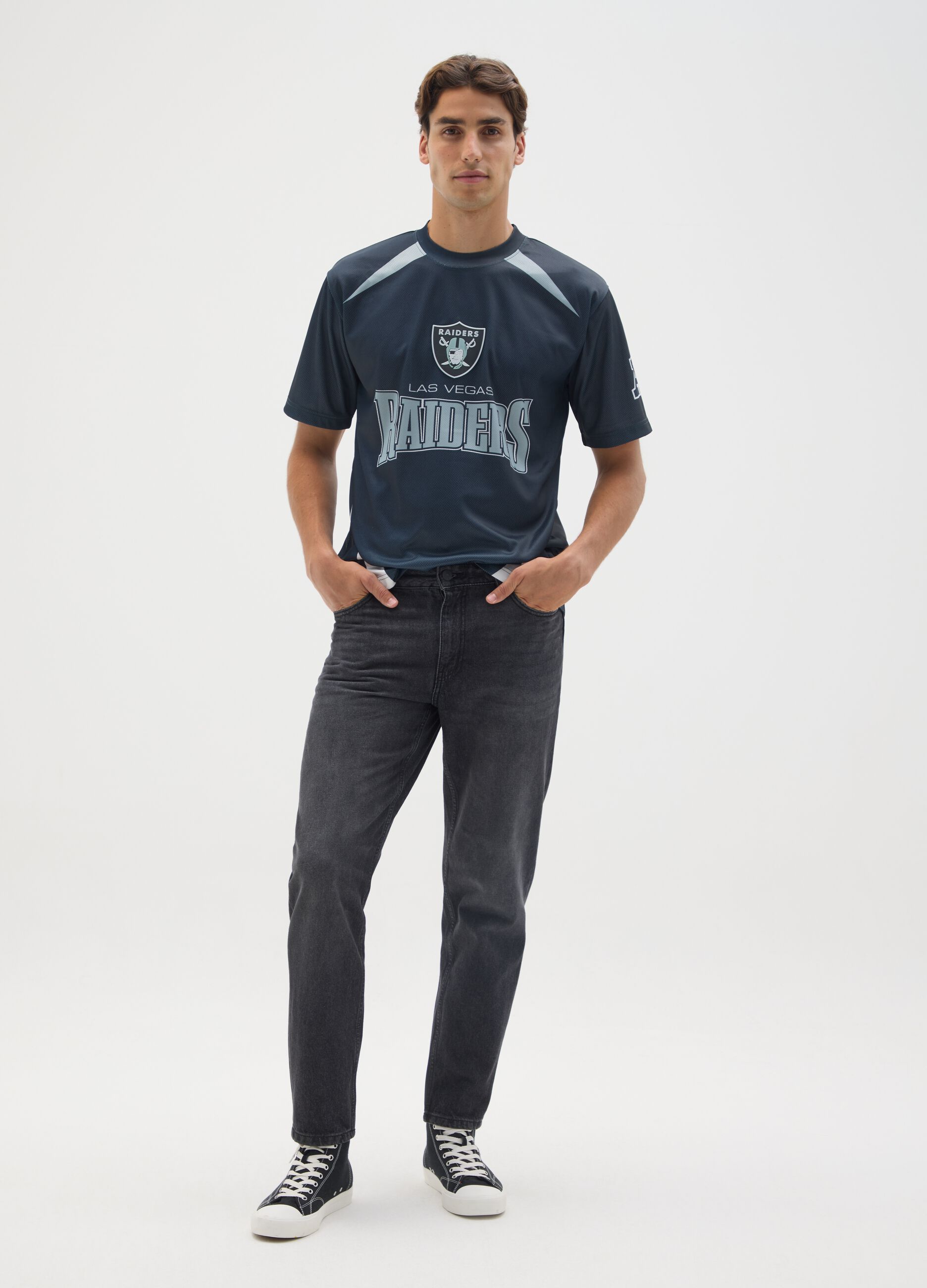 Blue T-shirt with Las Vegas Raiders graphics