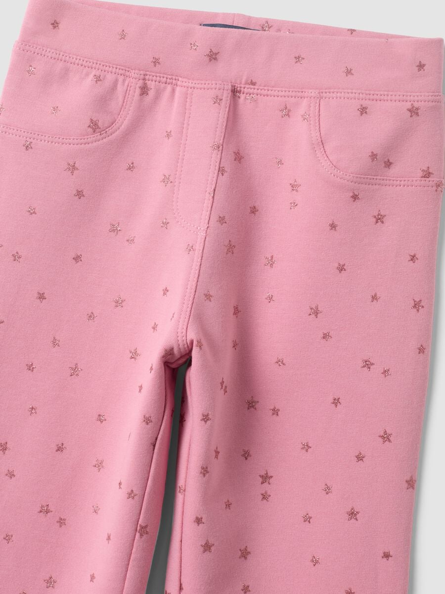Pink flared stretch cotton trousers with star print for girls_2
