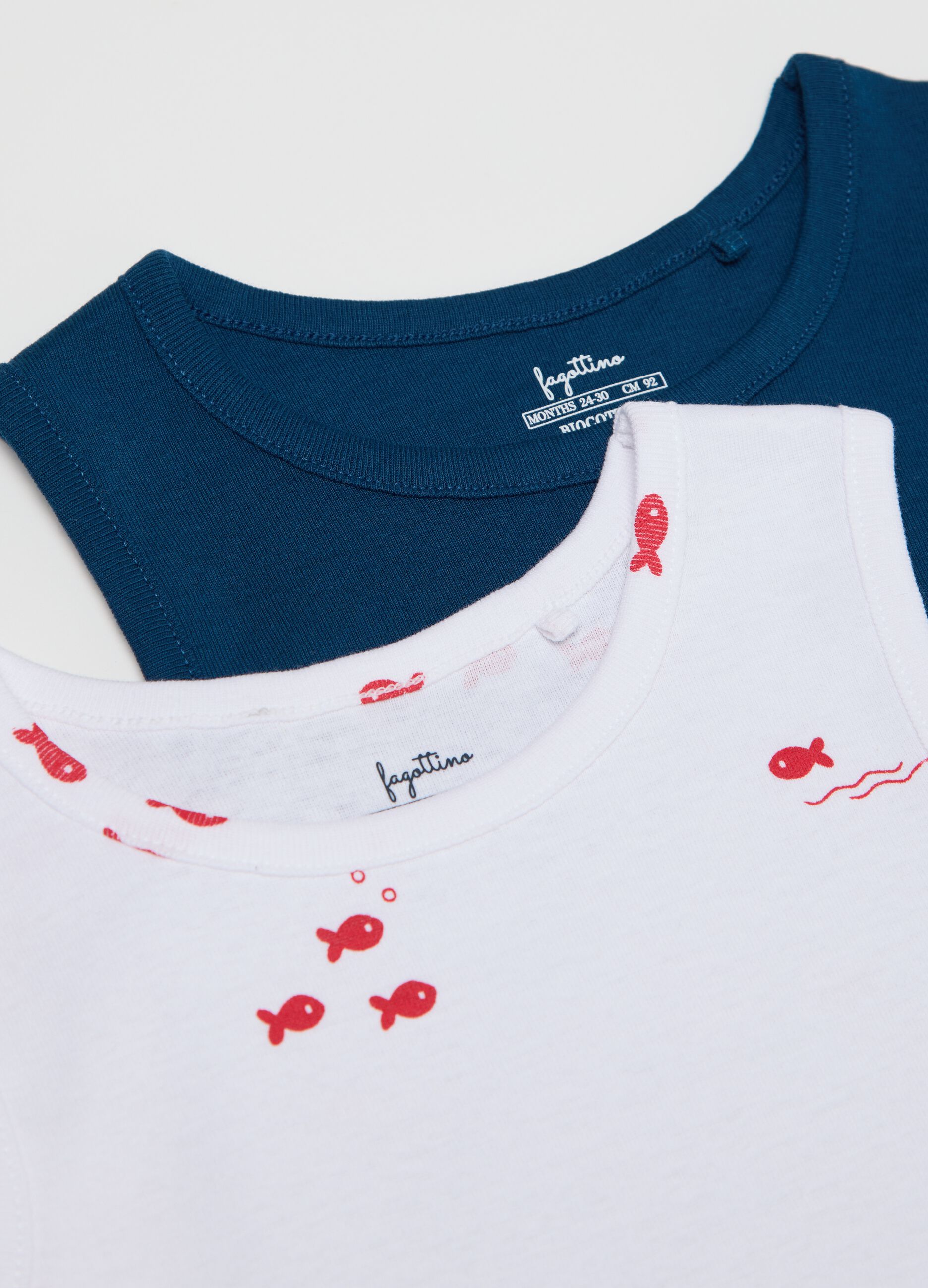 Three-pack white and blue bodysuits in organic cotton with print