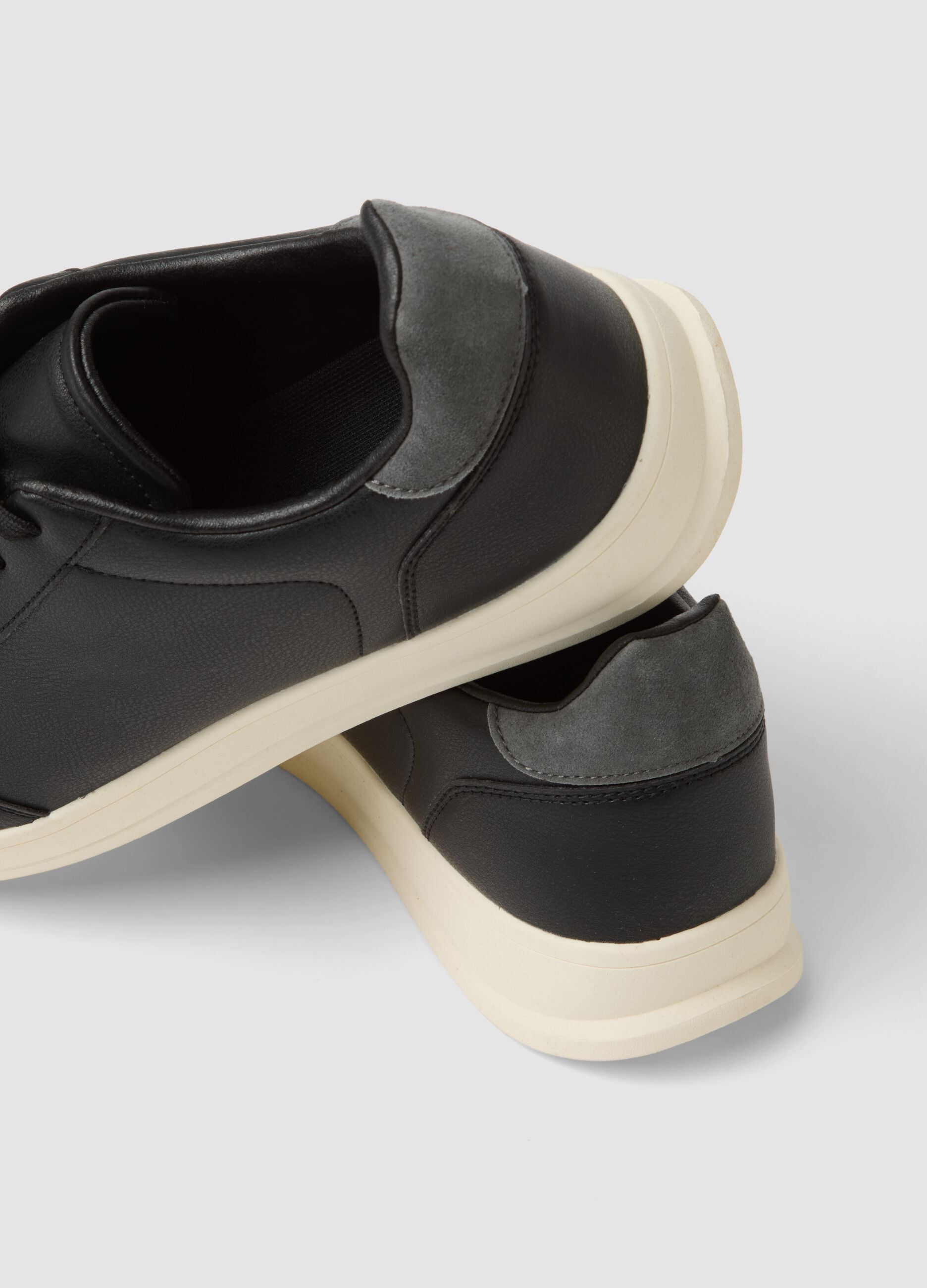 Black casual trainers with grey detail and contrast sole