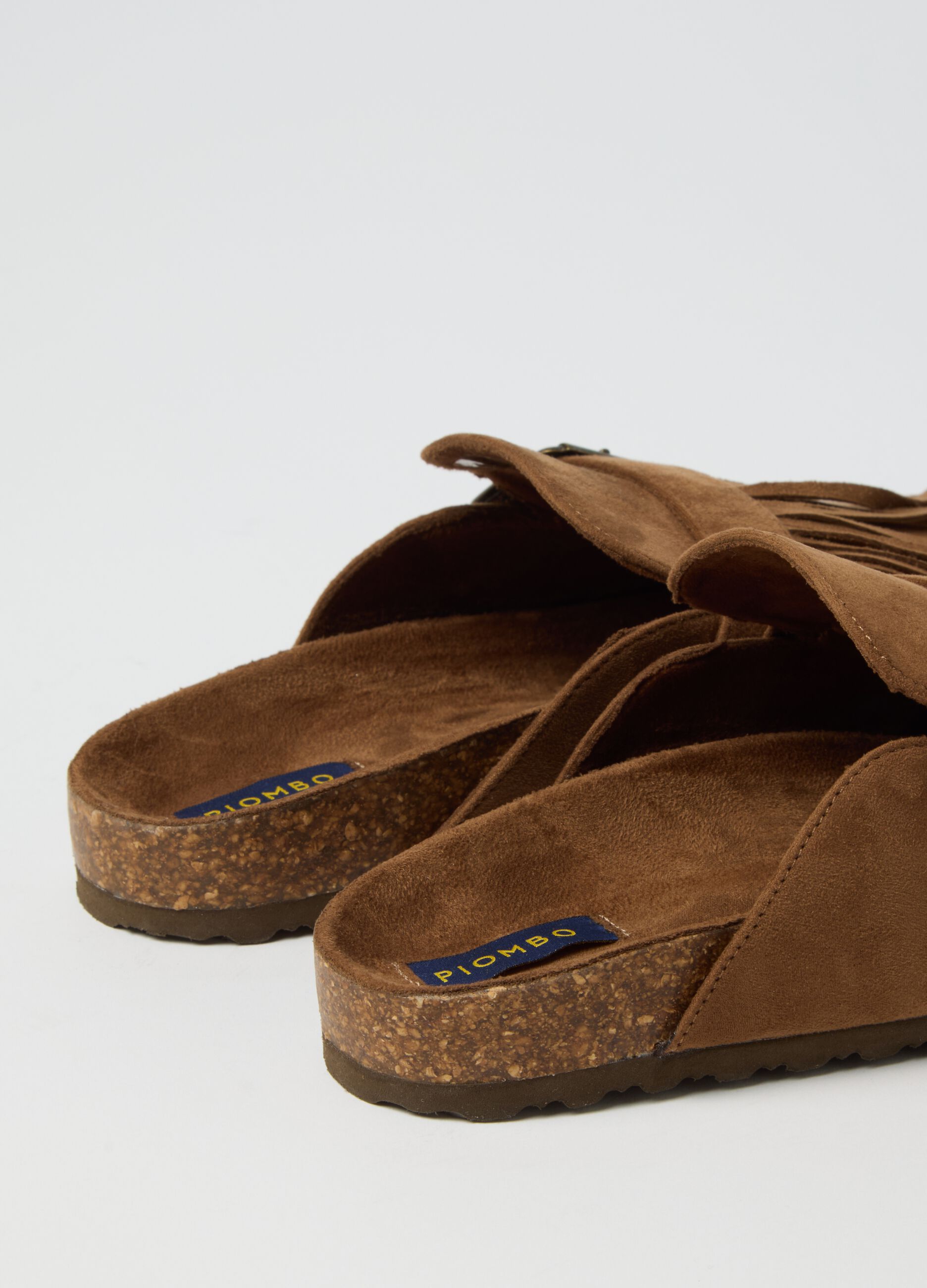 Brown clogs with fringes