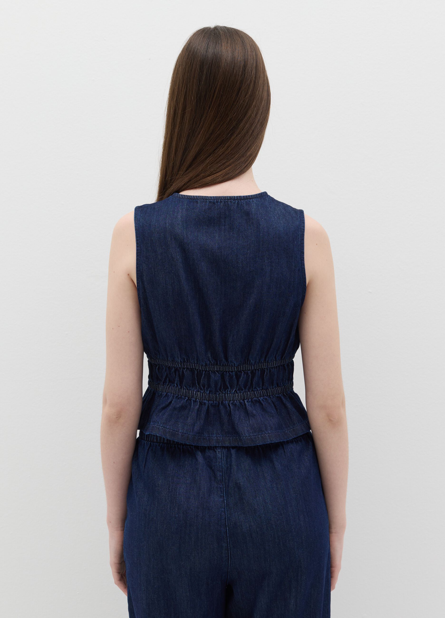Top in denim con laccetti