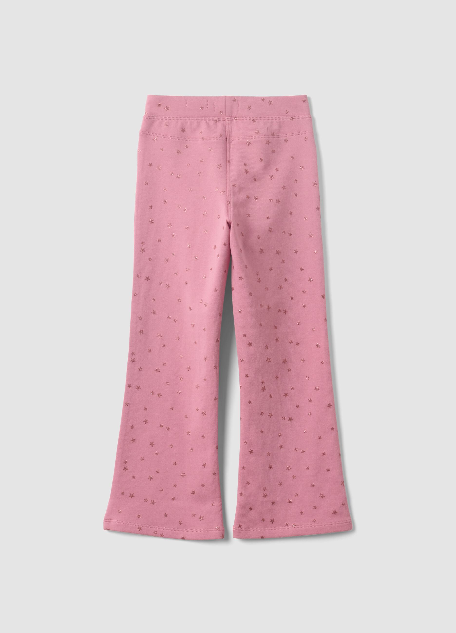 Pink flared stretch cotton trousers with star print for girls