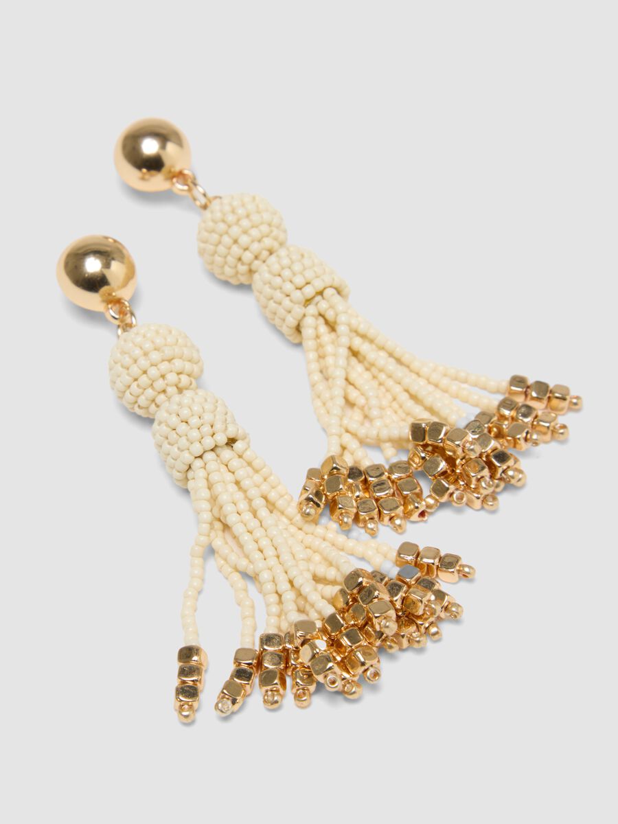 Elegant earrings with white glass beads and golden details_1