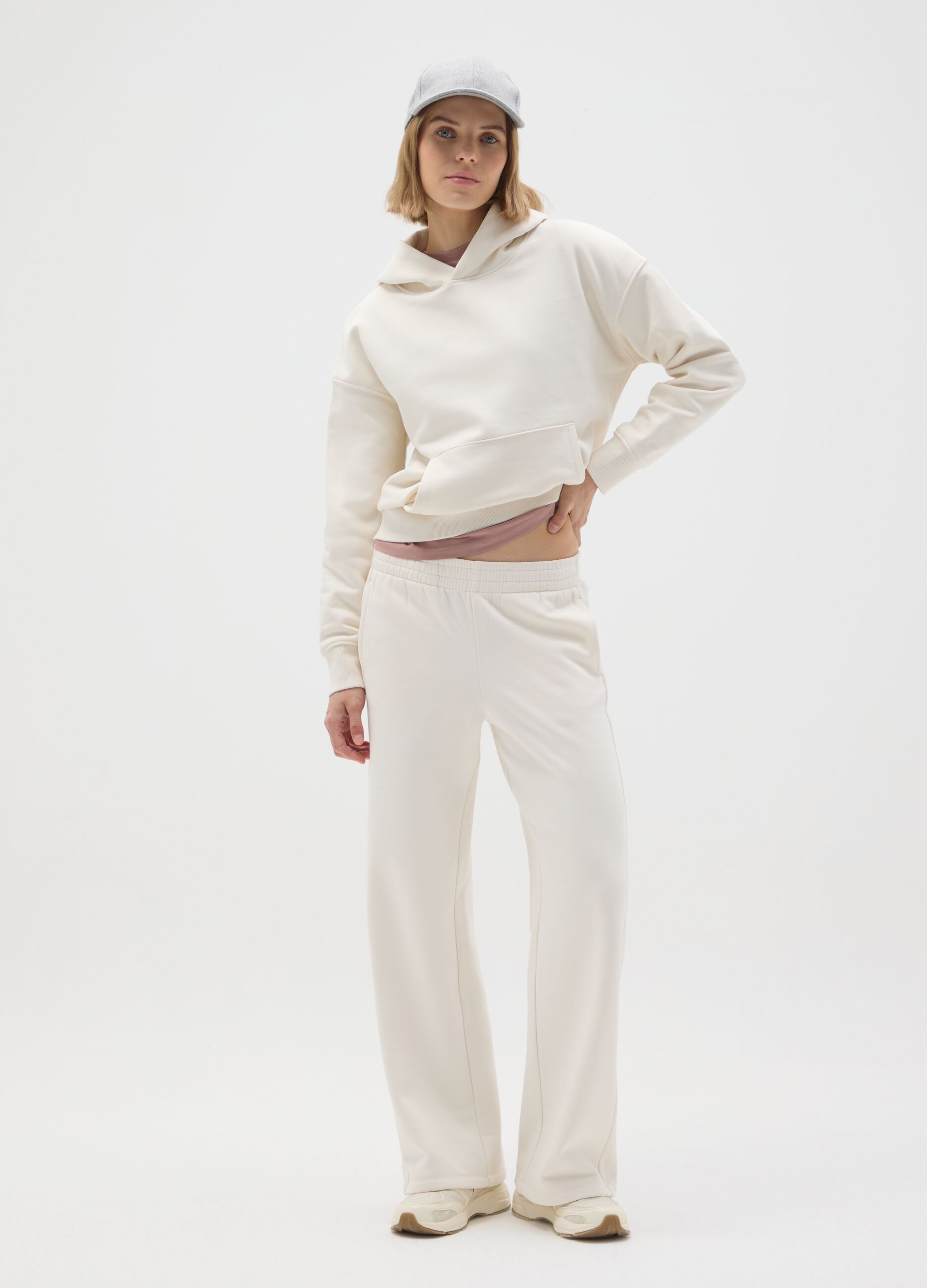 White cotton-blend relaxed trousers