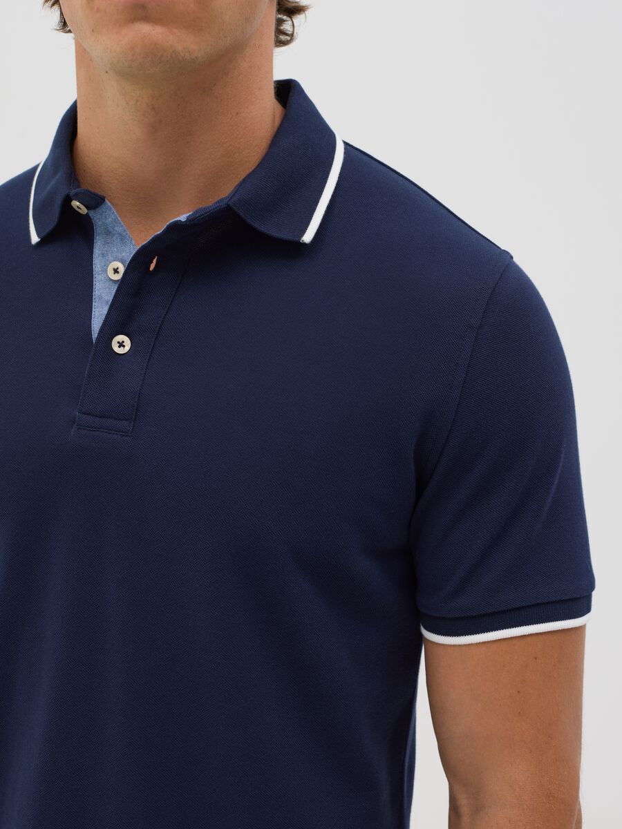 Blue polo shirt with short sleeves in cotton_3