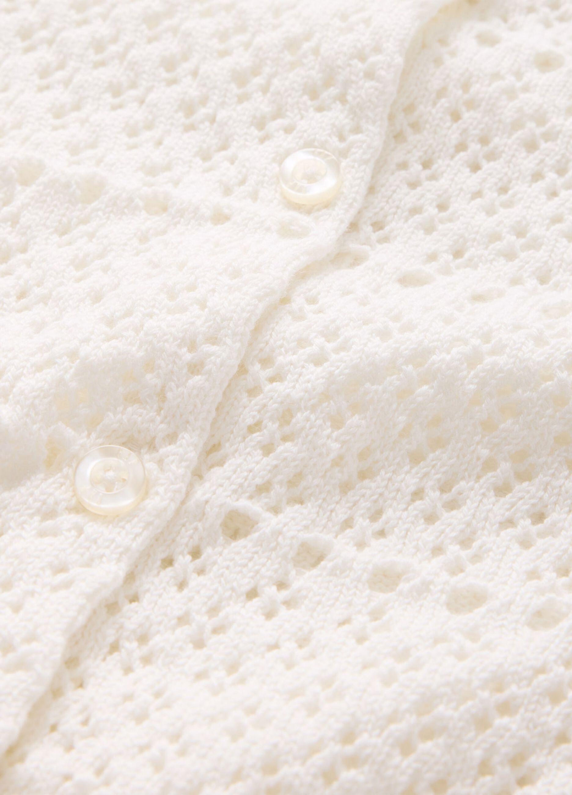 White cardigan with openwork design
