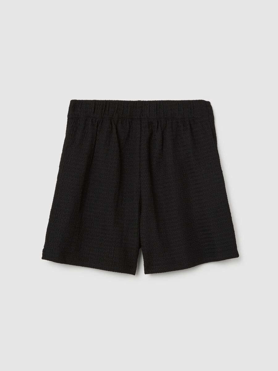 Girls' shorts in black stretch fabric_1
