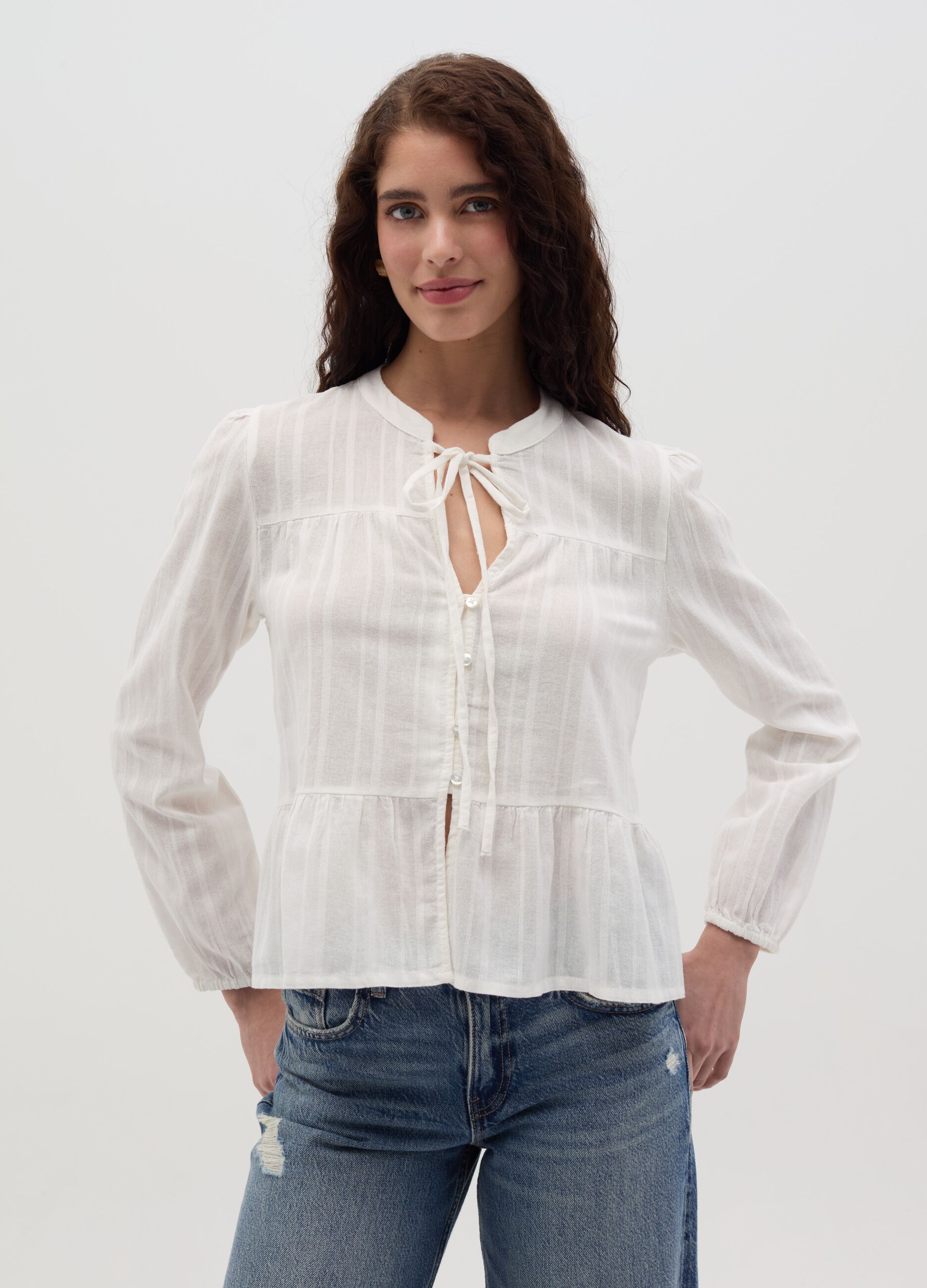 Blouse with laces and striped motif