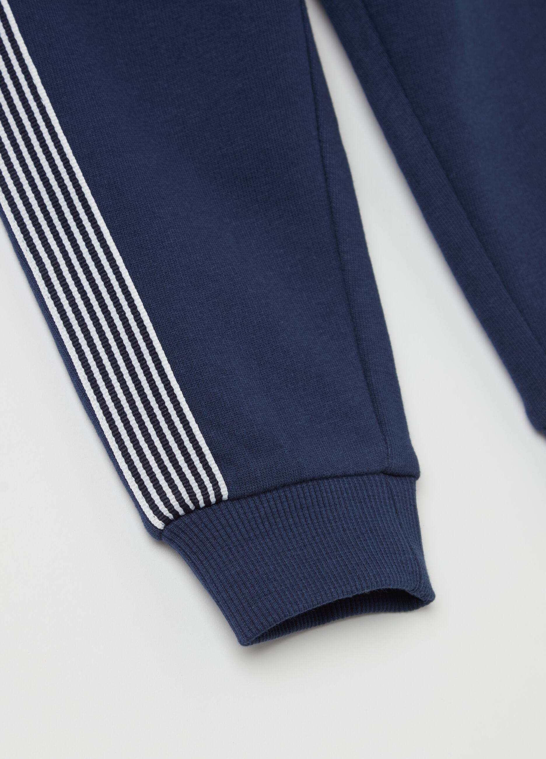 Joggers con coulisse e inserti a righe 