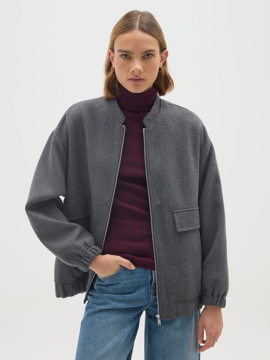 Giacca grigia con zip e vestibilità over_1