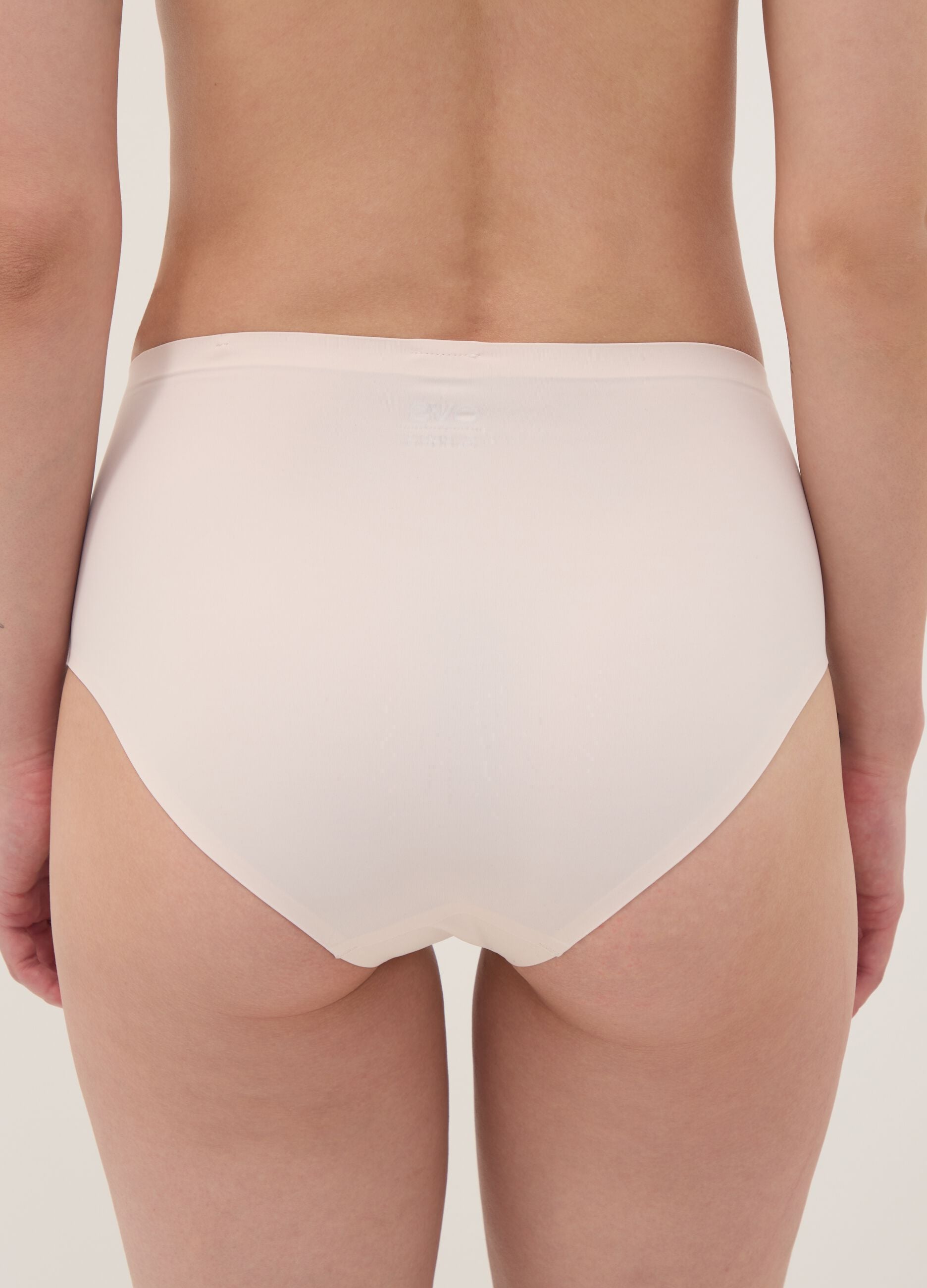 Pink high-waisted Brazilian briefs in stretch fabric with a shaping effect