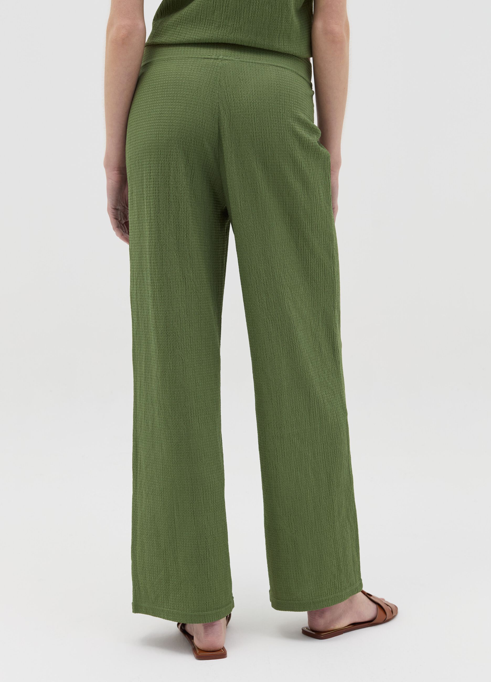 Wide-leg green trousers with waffle weave