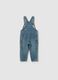 Denim dungarees with abrasions_1