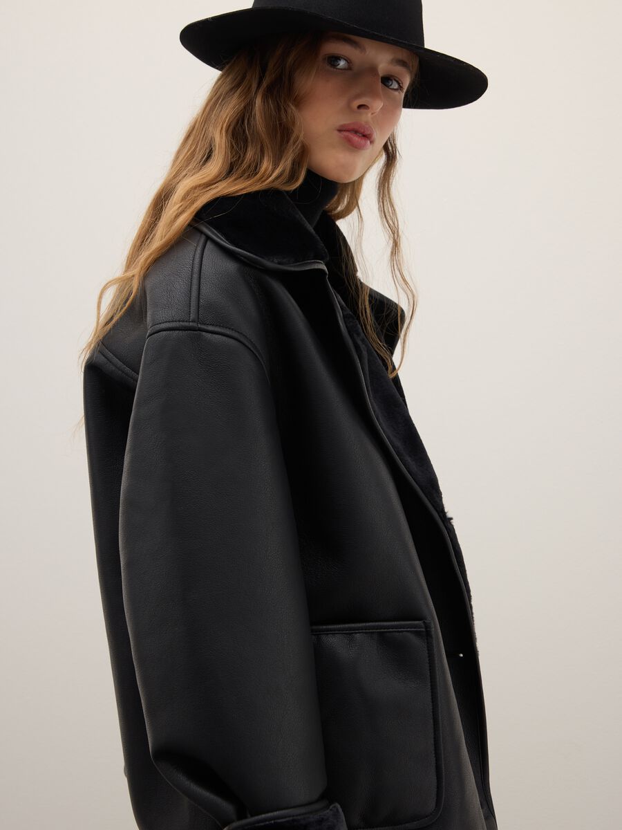 Oversized black jacket with buttons_0