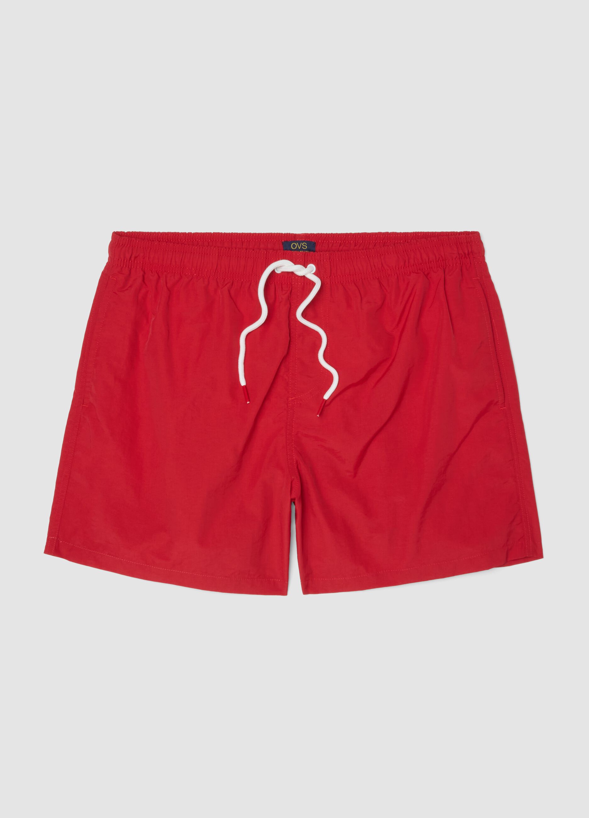 Red swim shorts with elasticated waist