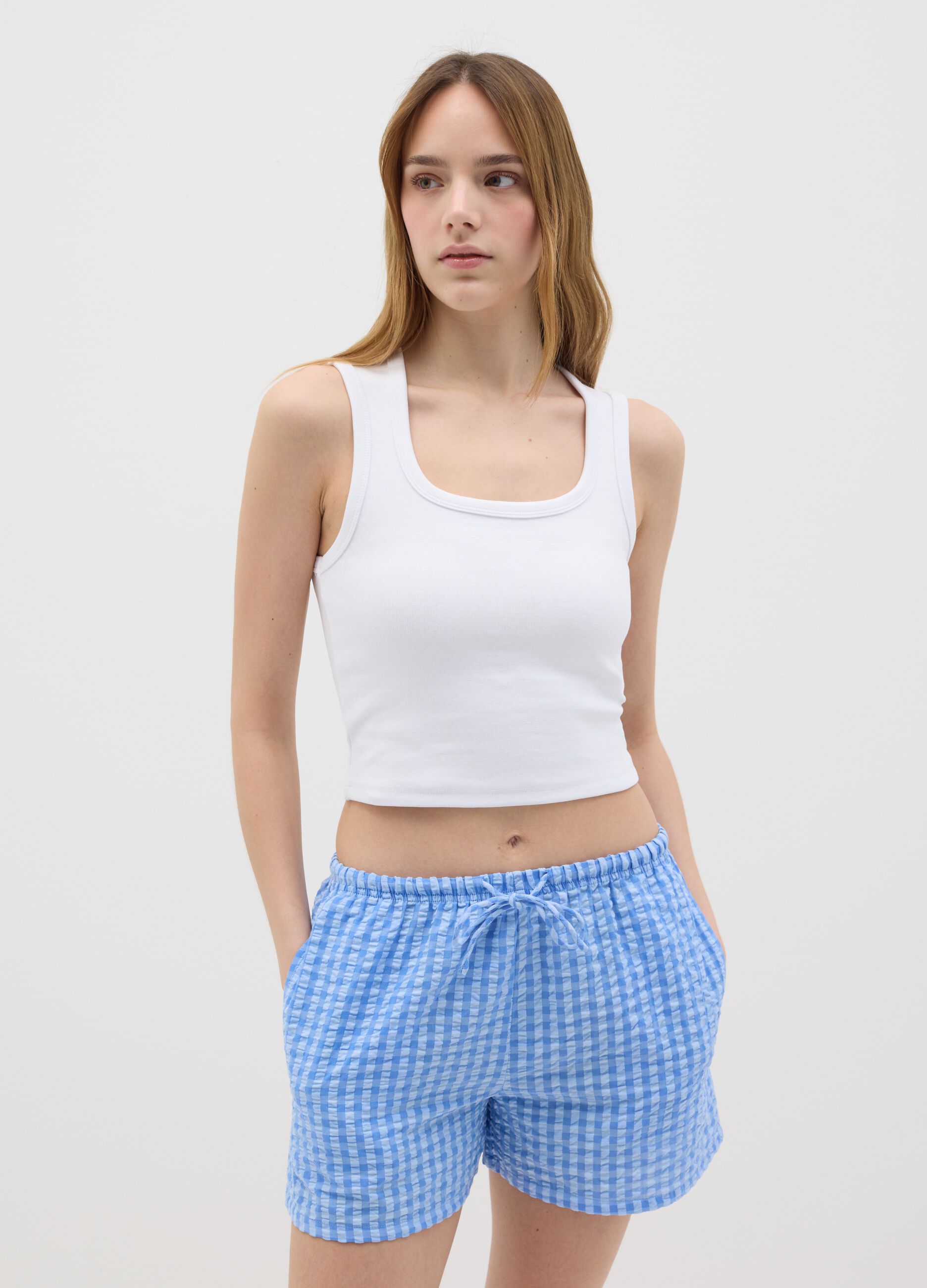 Women’s white fitted vest top in stretch cotton