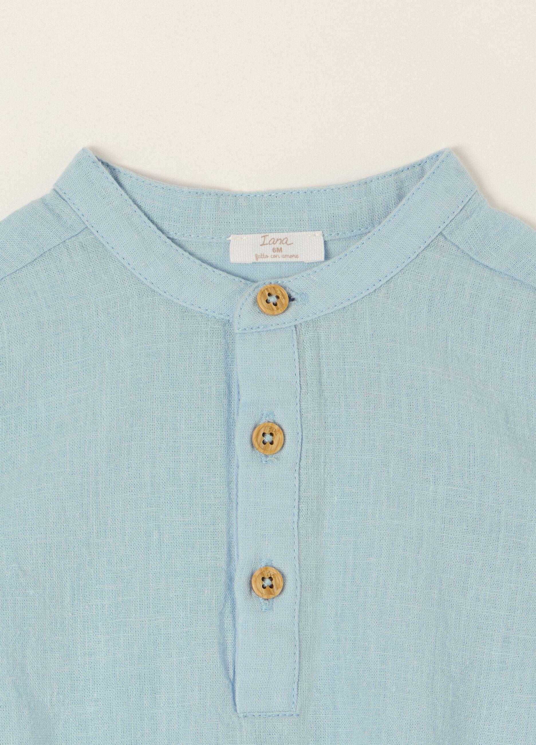 Light blue long-sleeve cotton and linen blend bodysuit