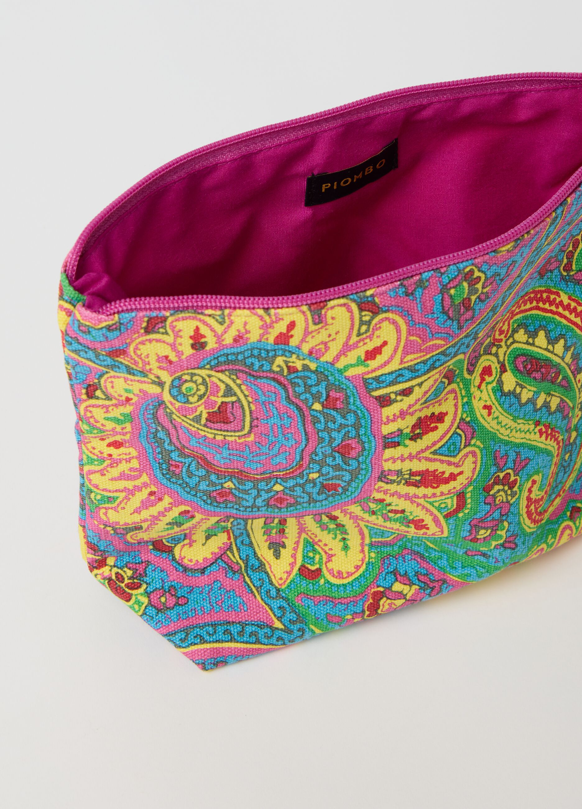 Clutch bag with tassel and paisley print