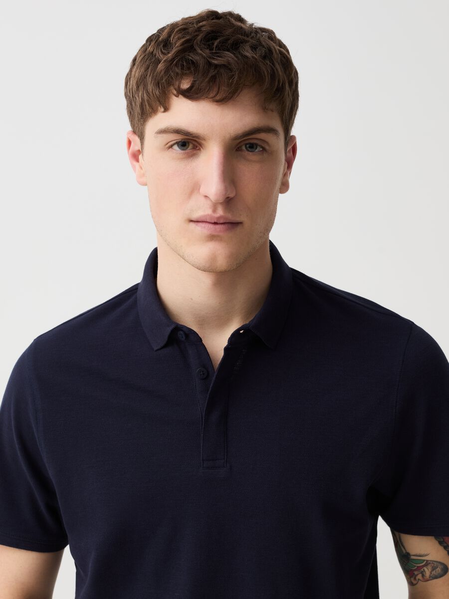 Solid colour piquet polo shirt_0