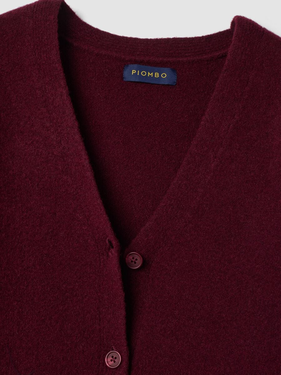 Cardigan rosso in lana elasticizzata con scollo profondo a V_5