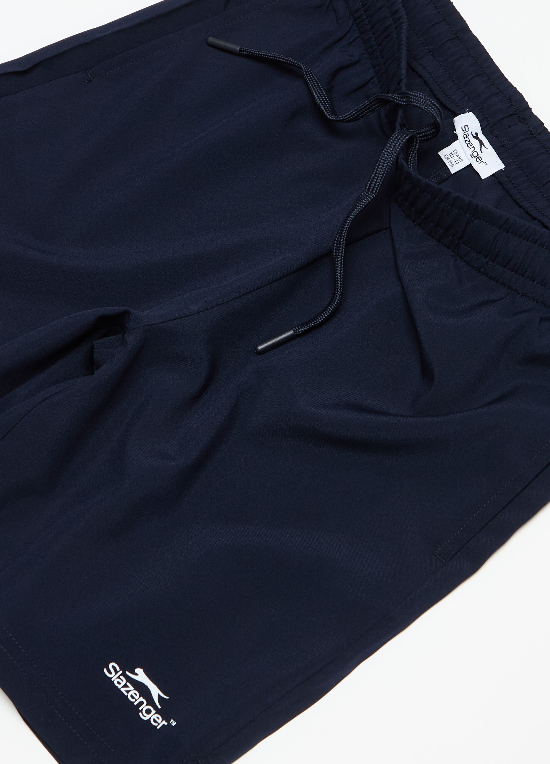 Quick-dry Bermuda tennis shorts with Slazenger print