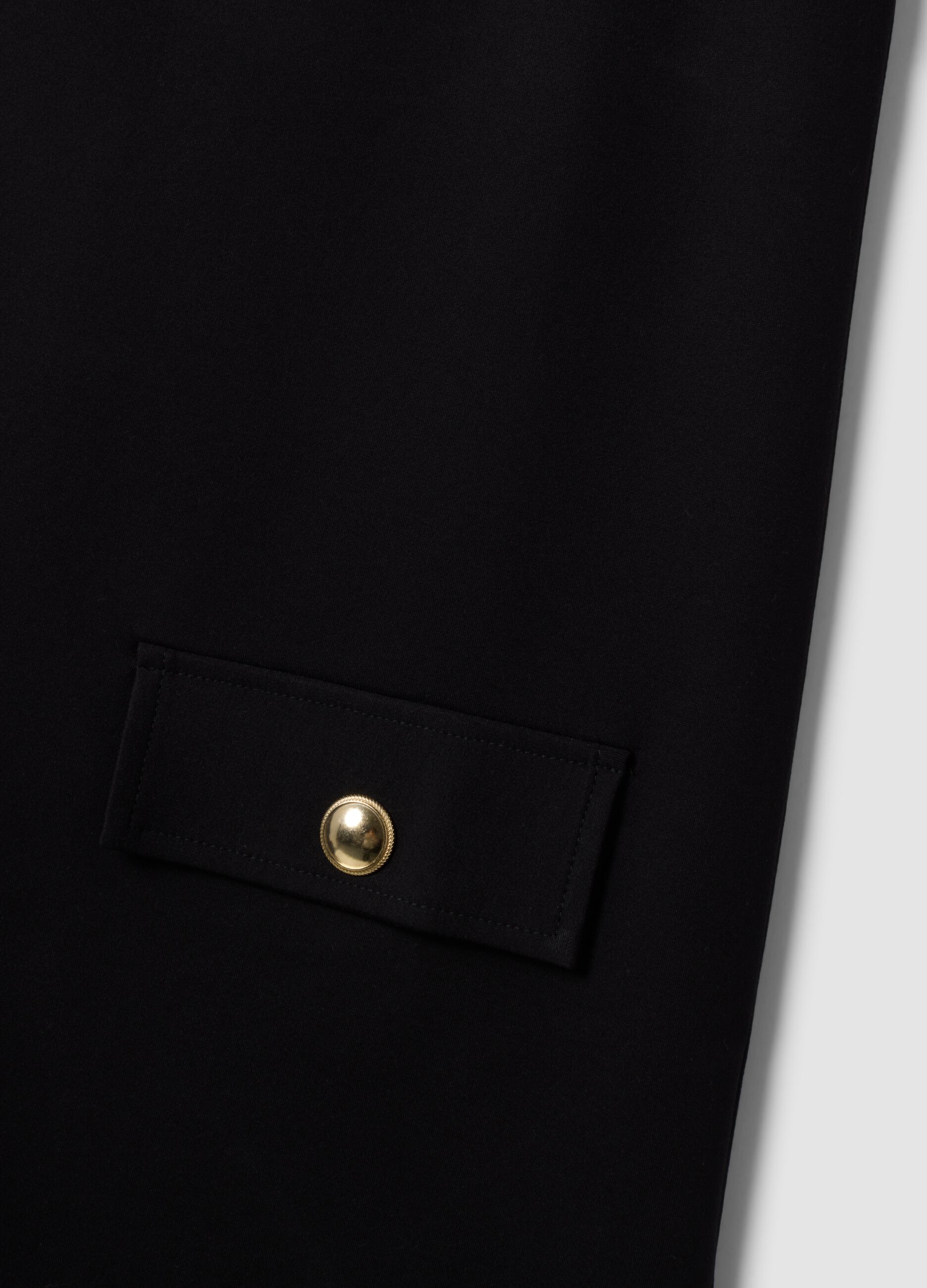 Abito smanicato nero in punto Milano di viscosa elasticizzata straight fit