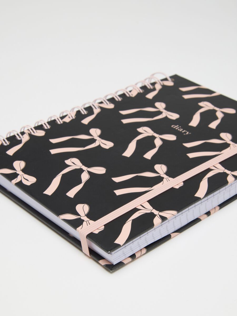 Quaderno in carta multicolor con fiocchi_1
