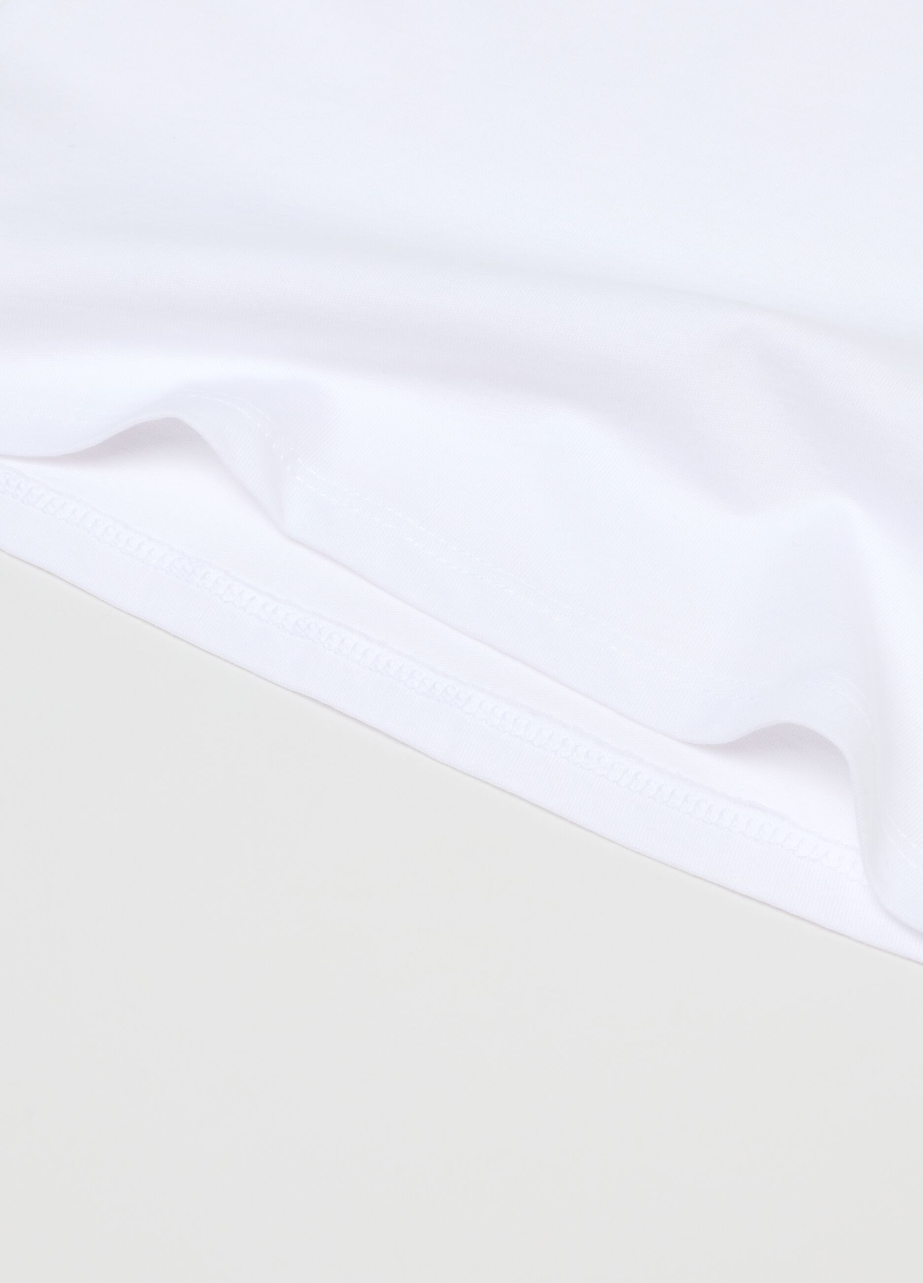 Pack of white girl's vests in pure cotton regular fit