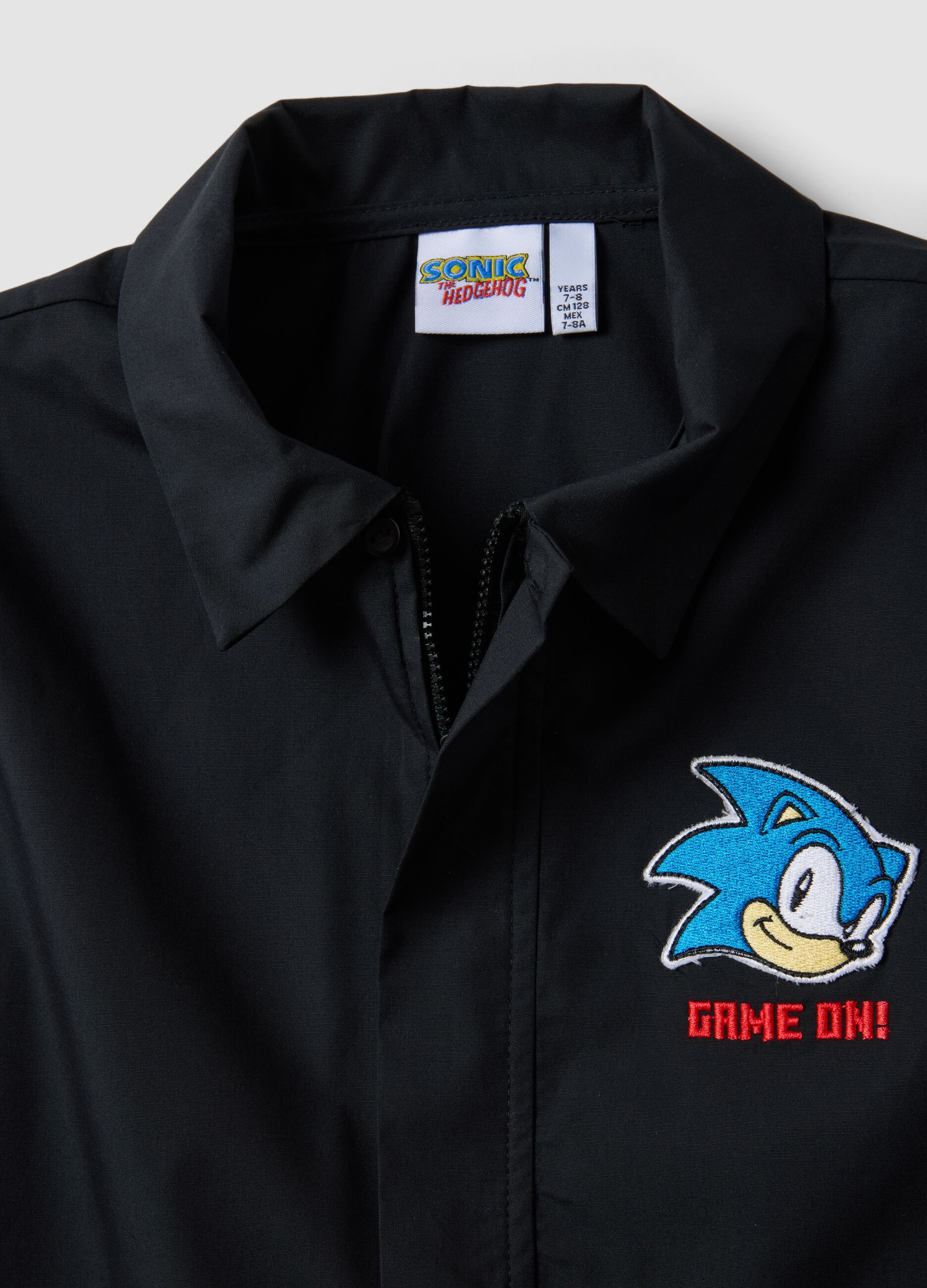 Black kids&rsquo; school smock with zip and Sonic embroidery