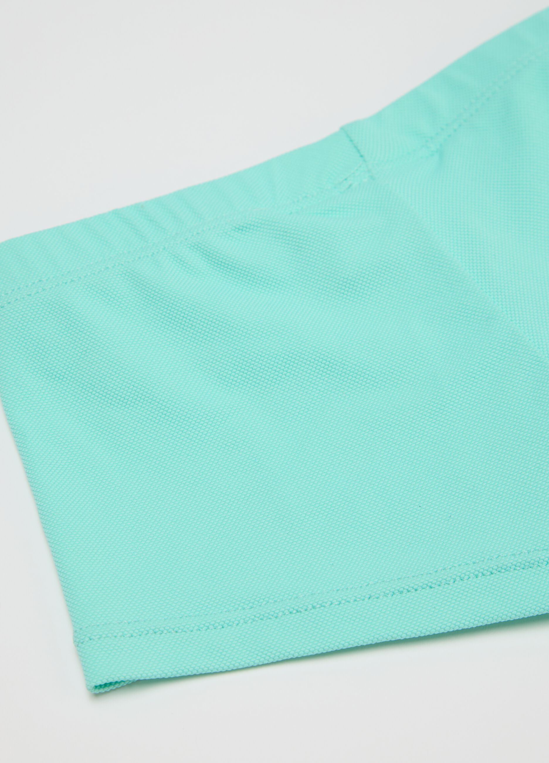 Boys’ swimsuit in light blue stretch fabric with print