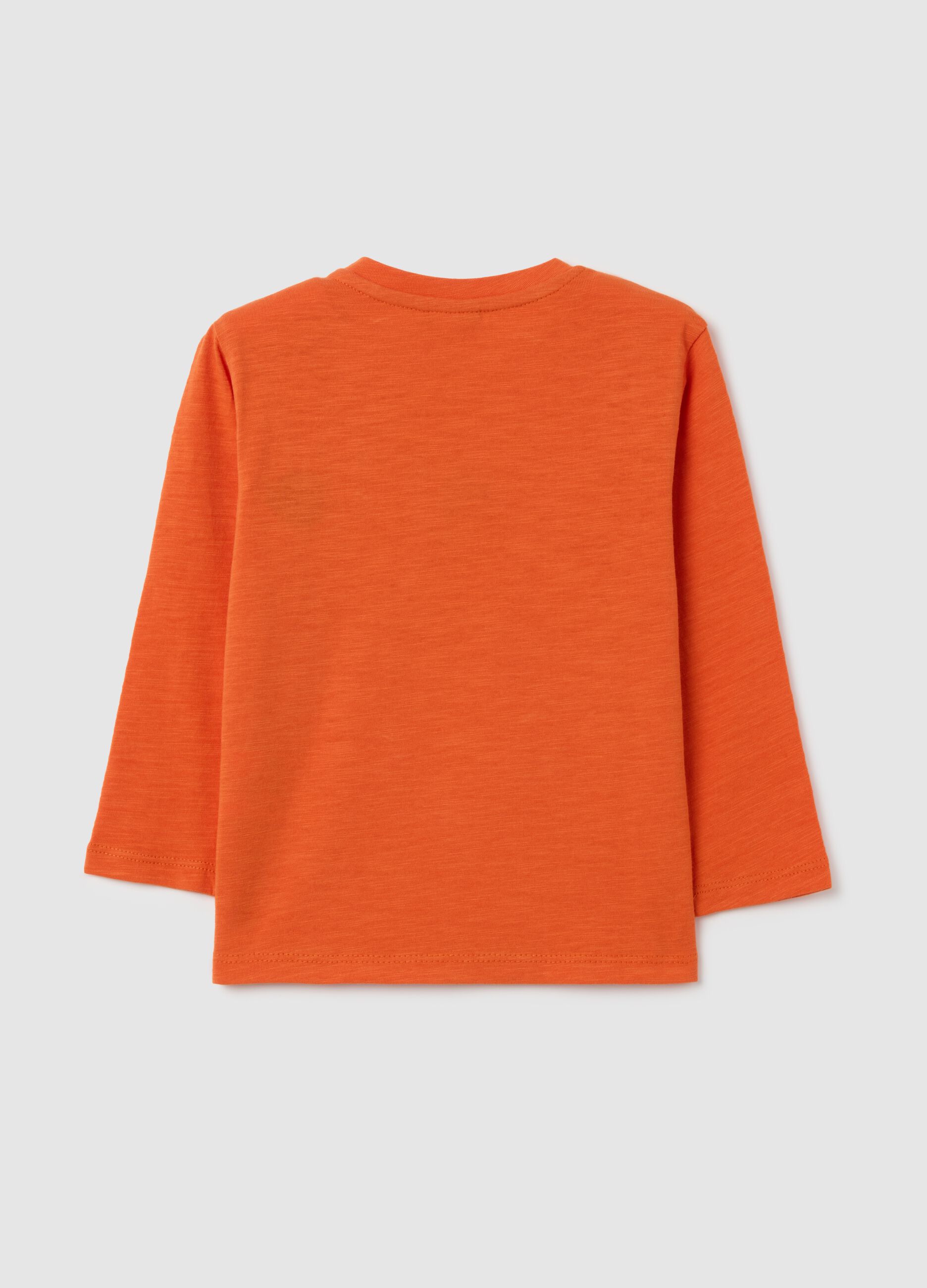 T-shirt arancione a maniche lunghe con applicazioni