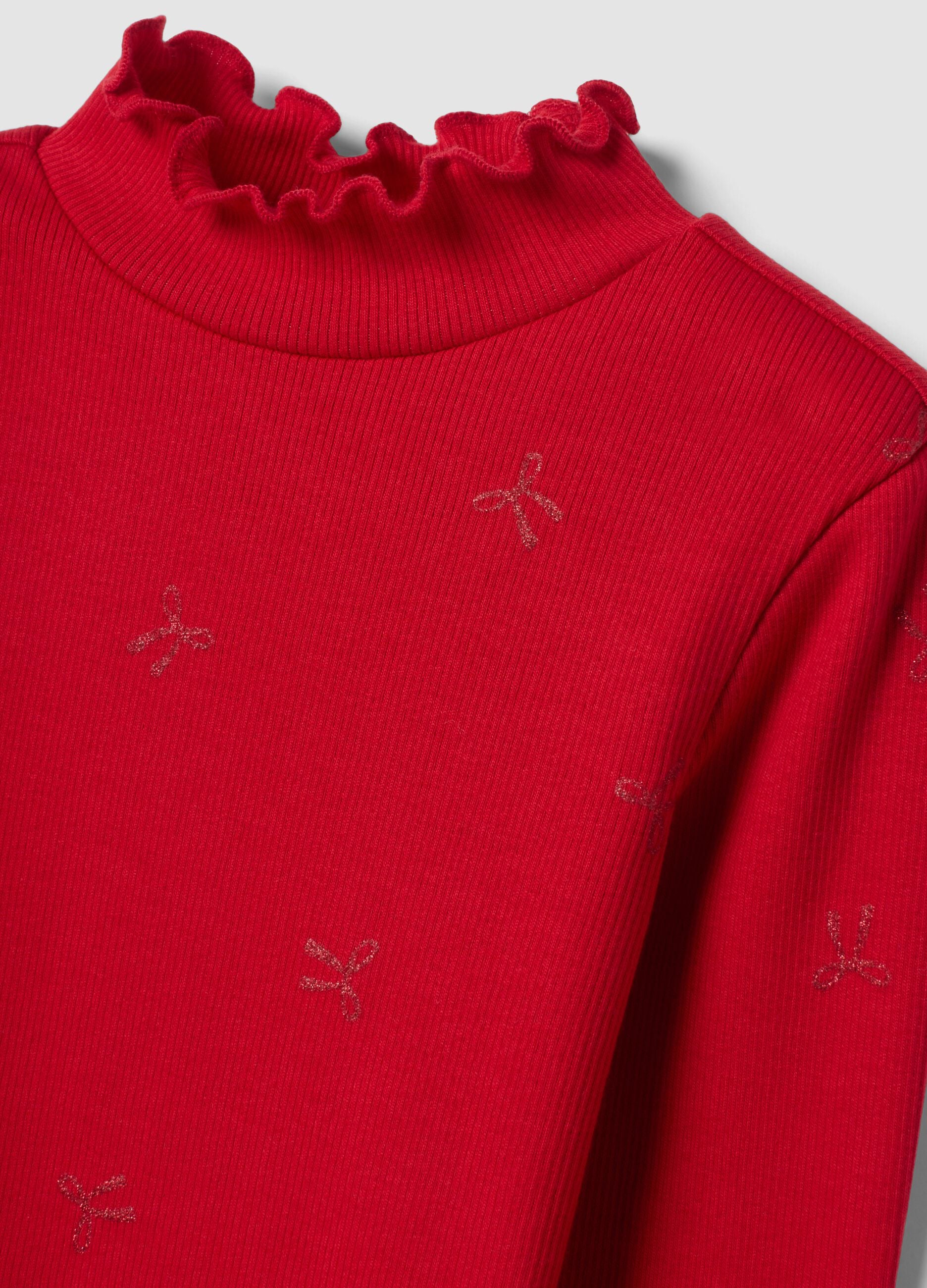 Maglia rossa in cotone elasticizzato con fiocchi glitter