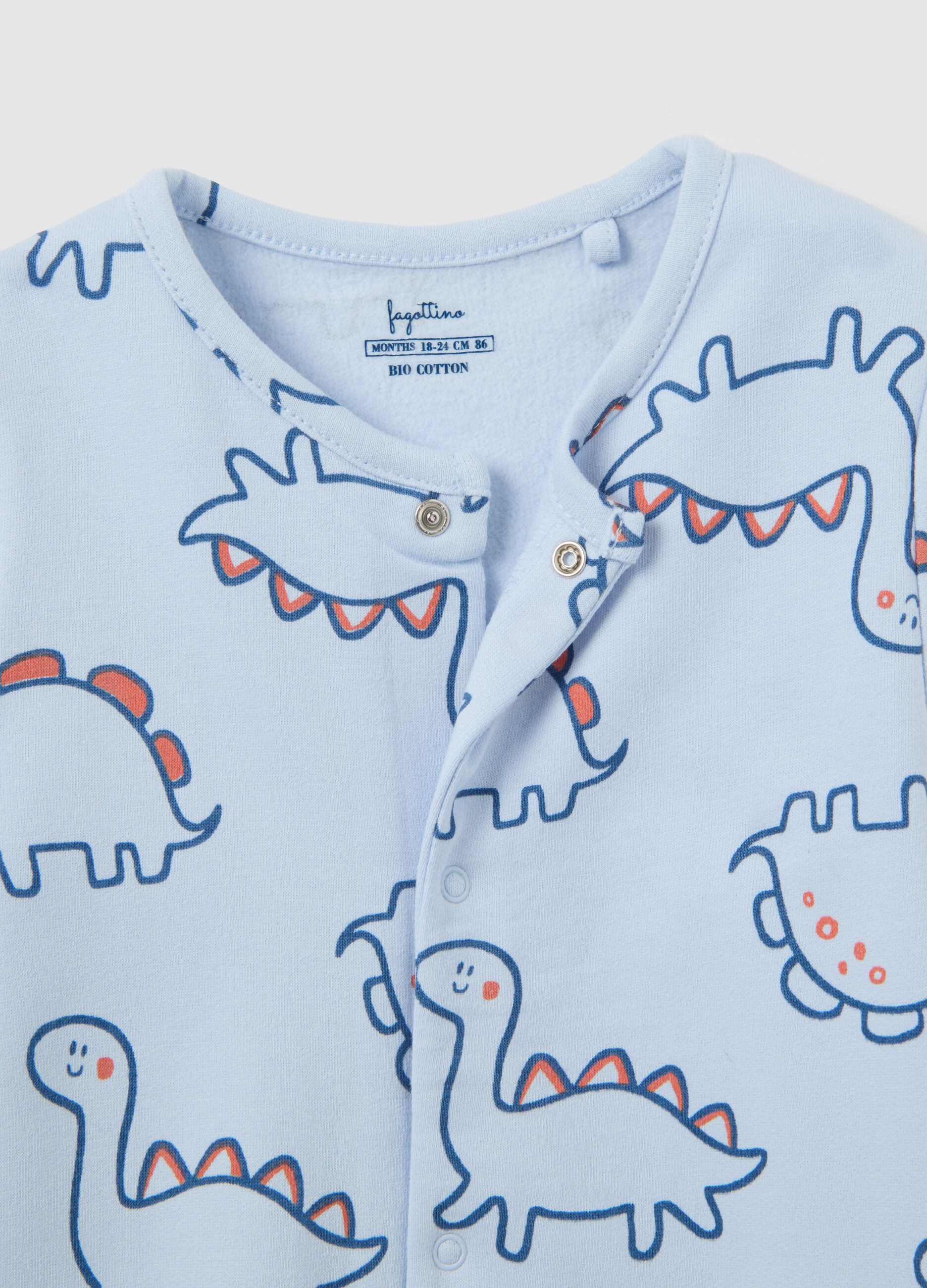 Blue cotton jumpsuit with dinosaur print