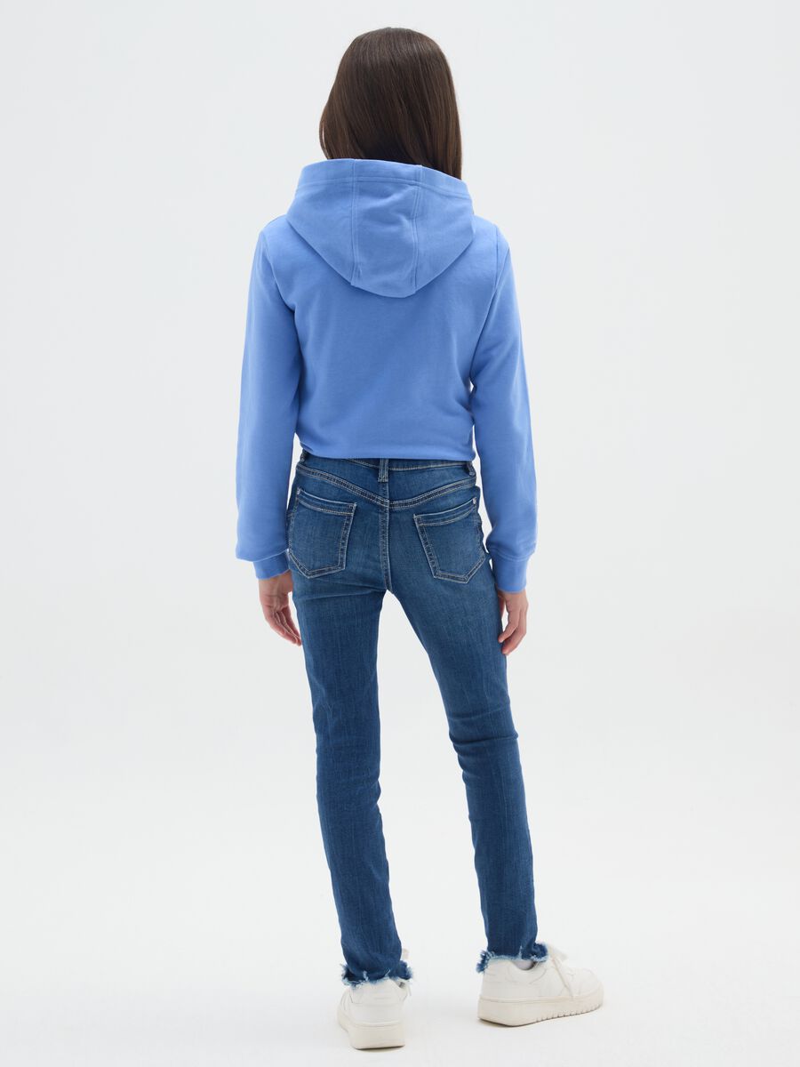 Slim-fit destroyed jeans with five pockets_1