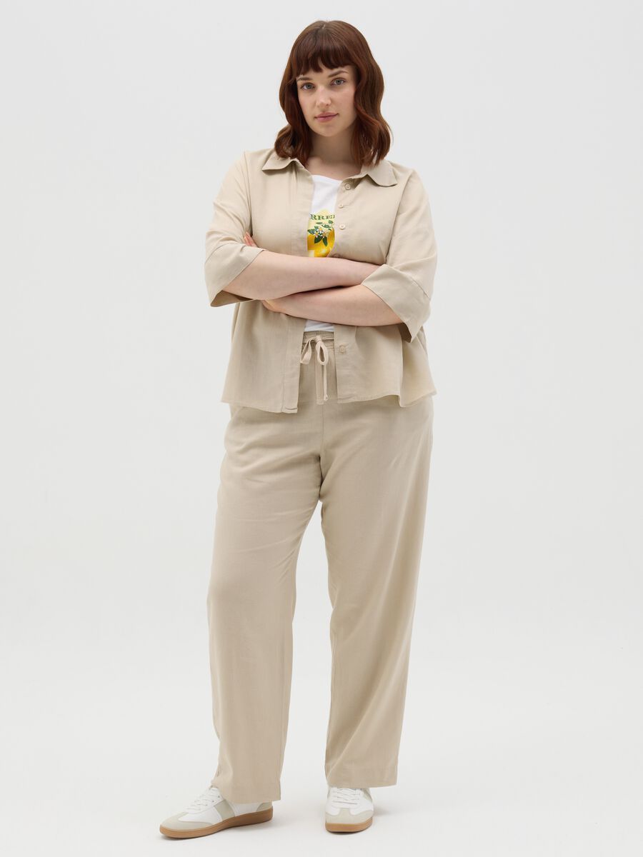 Curvy grey pinstriped shirt with kimono sleeves_1