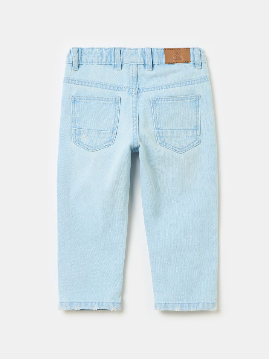 Jeans in cotone con abrasioni_1