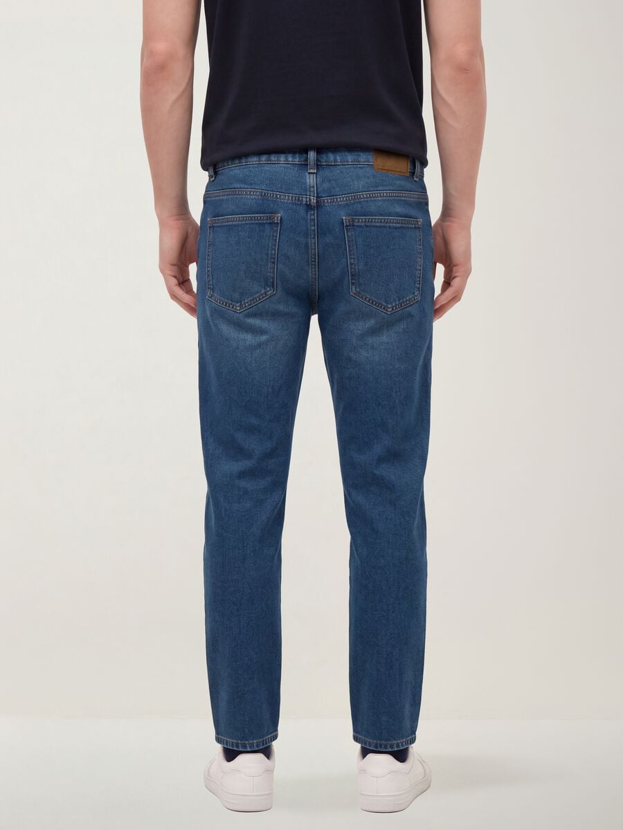 Jeans blu denim in misto cotone e viscosa slim fit_2