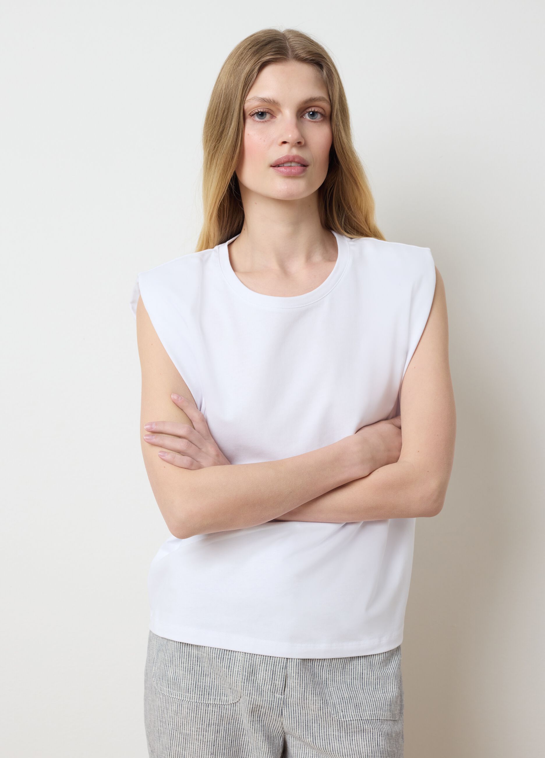 White sleeveless boxy-fit T-shirt with spaghetti straps