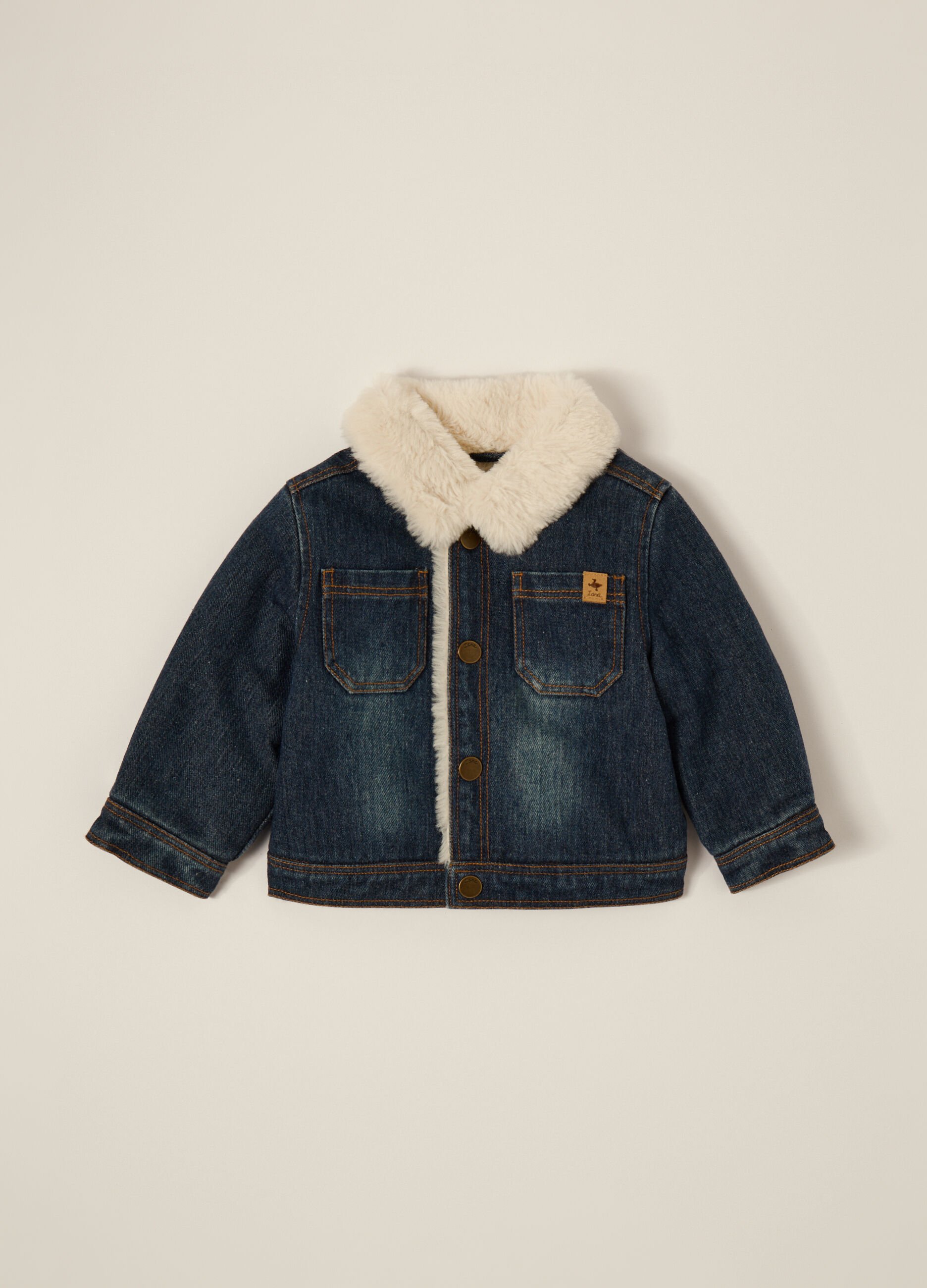 Blue denim jacket with fur lining