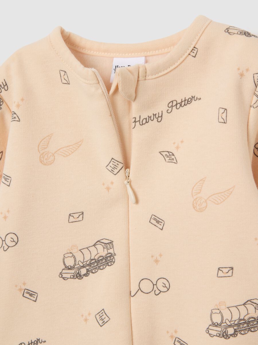 Beige baby girl jumpsuit with Harry Potter print_2