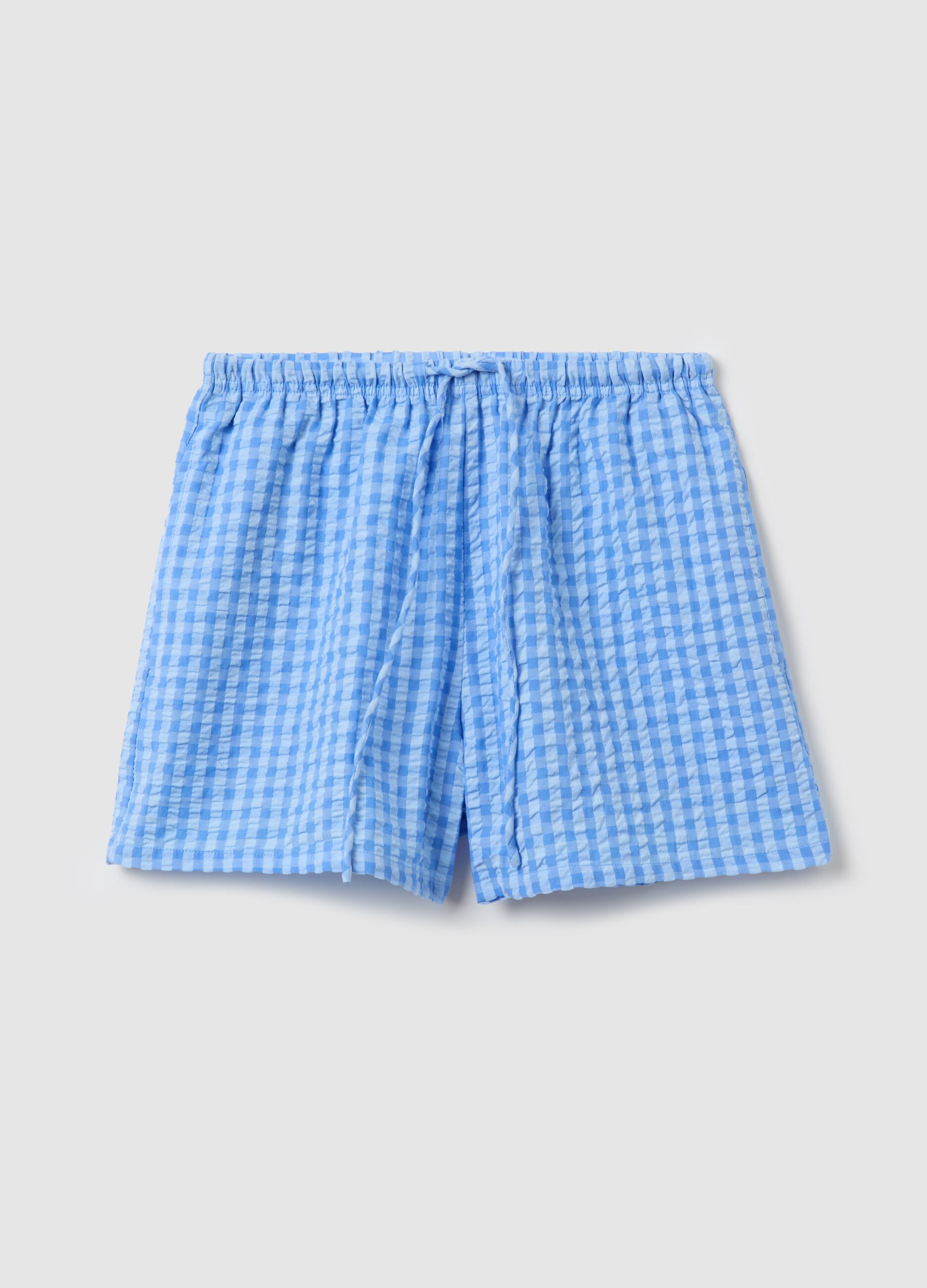 Light blue shorts in striped cotton
