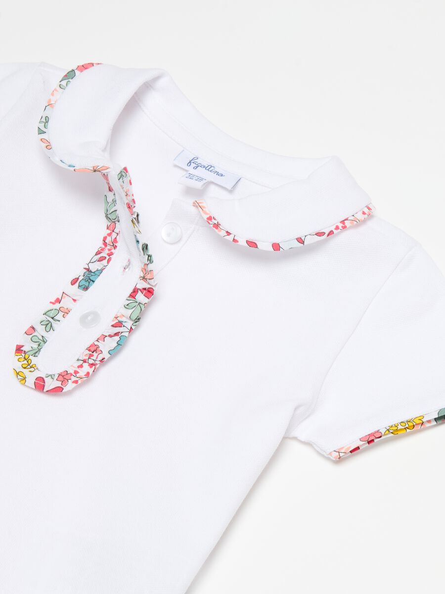 Polo shirt in piquet with floral patterned trims_2