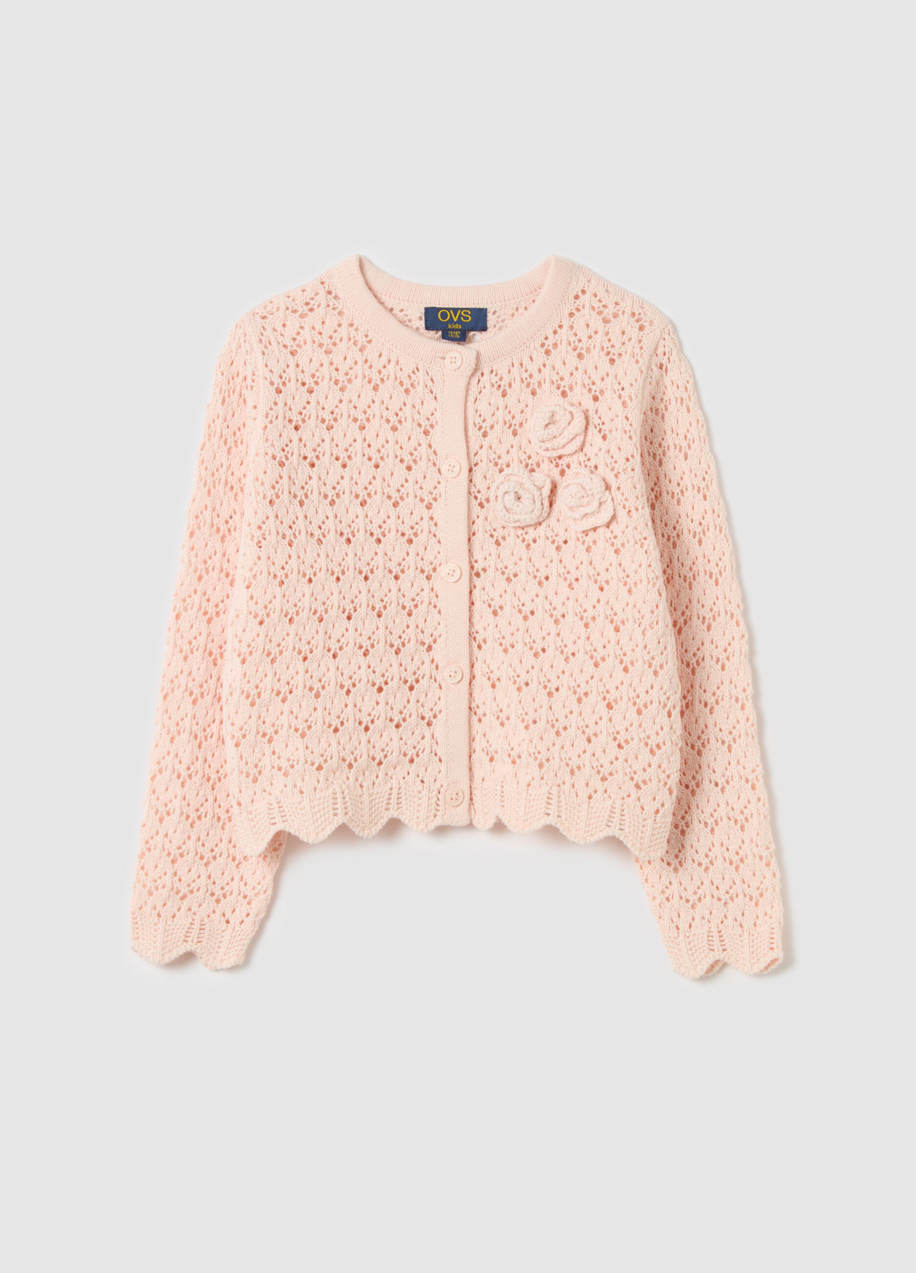 Cardigan with openwork weave and crochet flowers