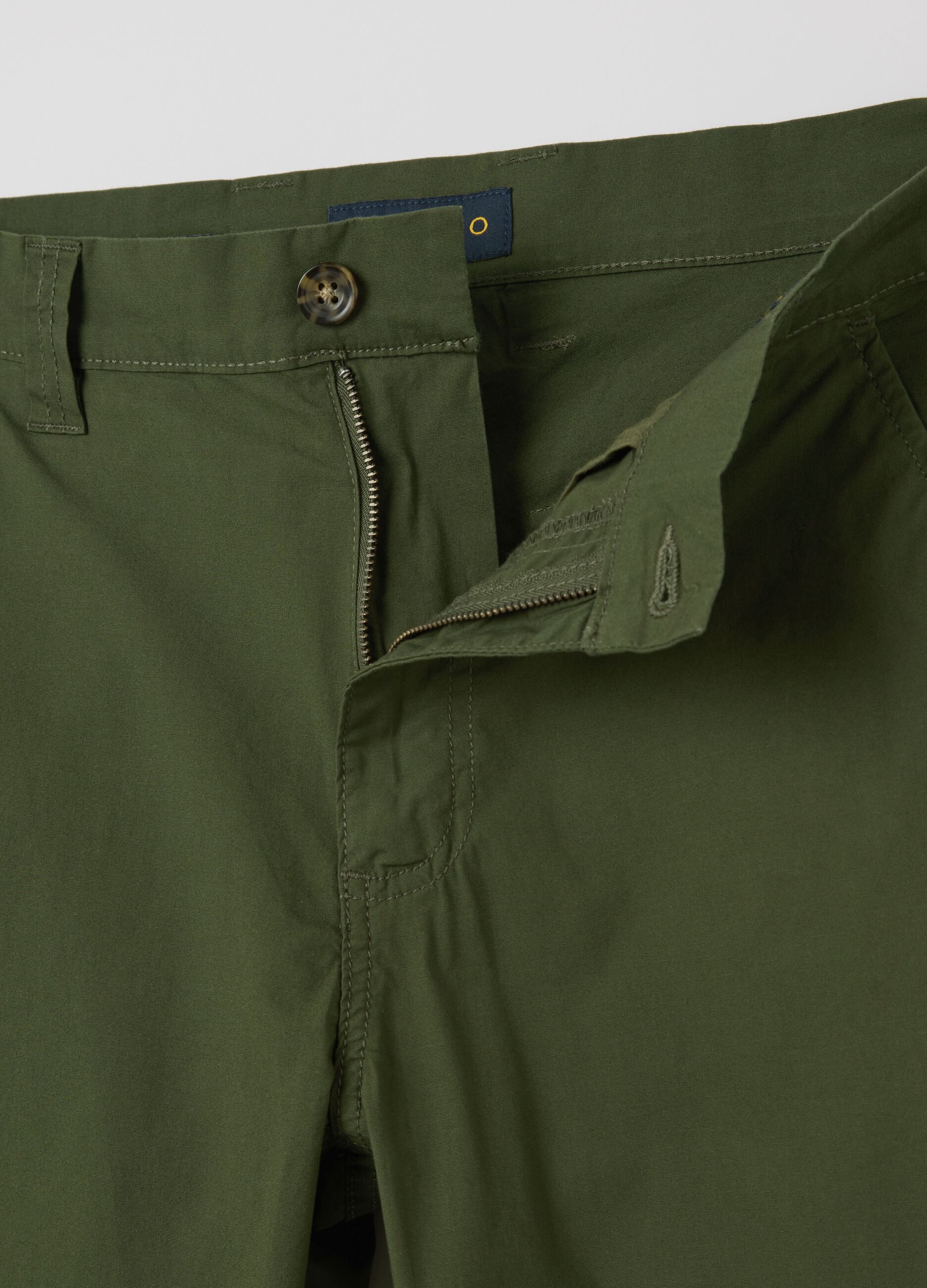 Green chino trousers in stretch cotton with pockets